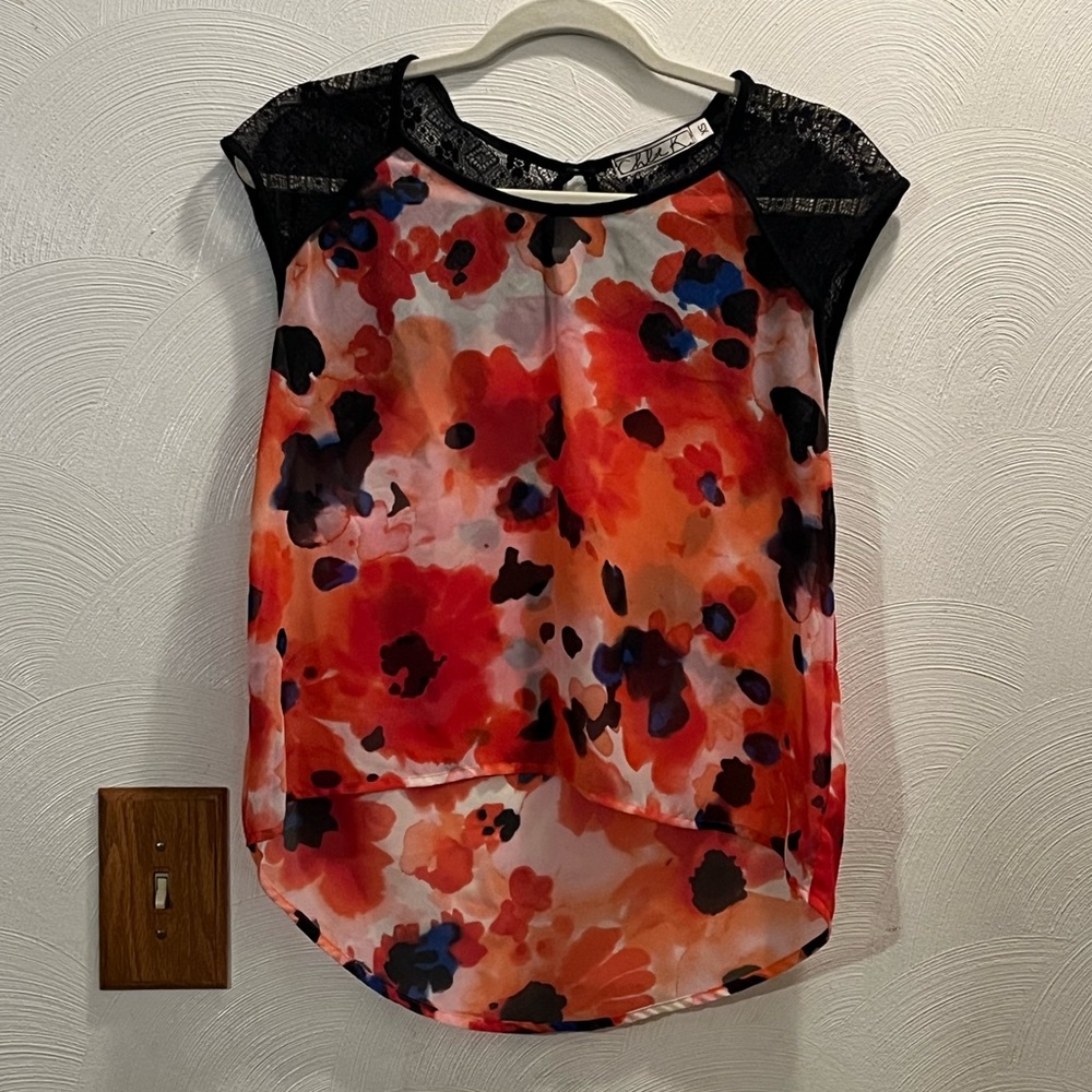 Chloe K  Sheer Abstract Floral and Black Lace Top with Hi-Lo Hem. Size XS.